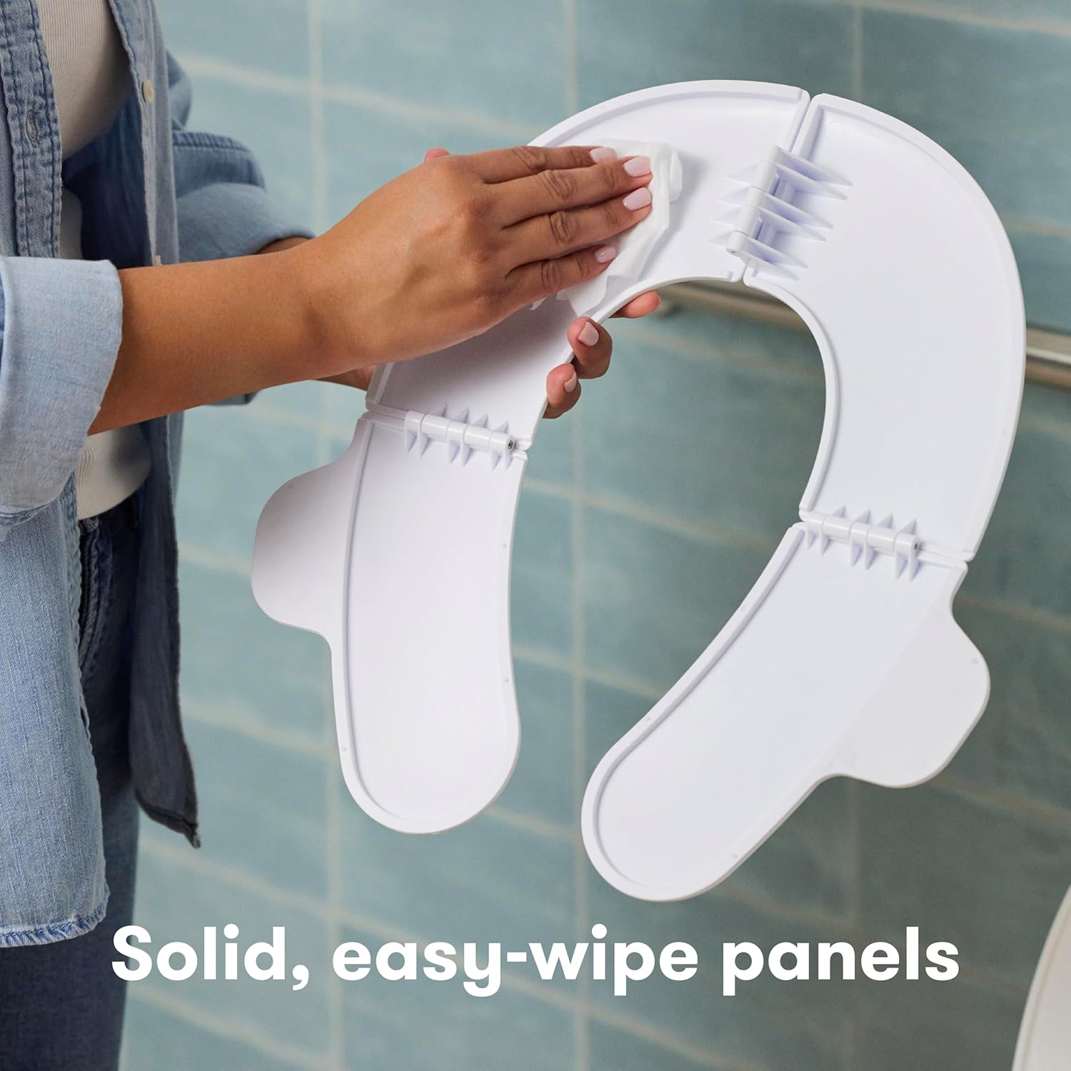Frida Baby Fold-and-Go Portable Potty Seat for Toilet, Foldable Travel Potty Seat for Toddler, Fits Round & Oval Toilets, Non-Slip Base, Handles, Includes Free Travel Bag